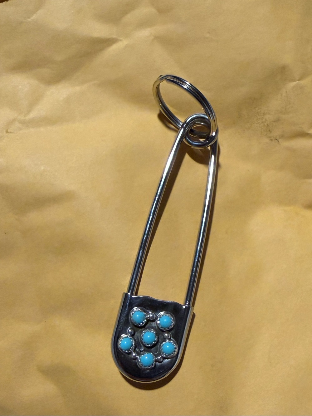 Native made silver and turquoise safety pin